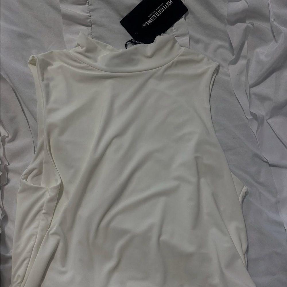 White Sleeveless Top